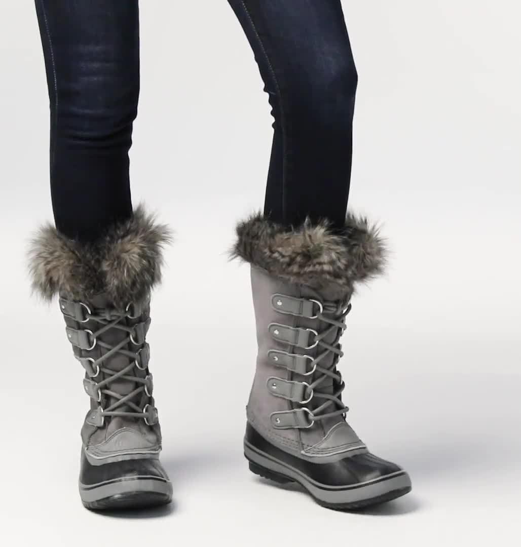 SOREL Joan of Arctic women's winter boot in Quarry Black - front lifestyle view
